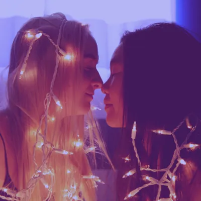 queer women having an intimate moment